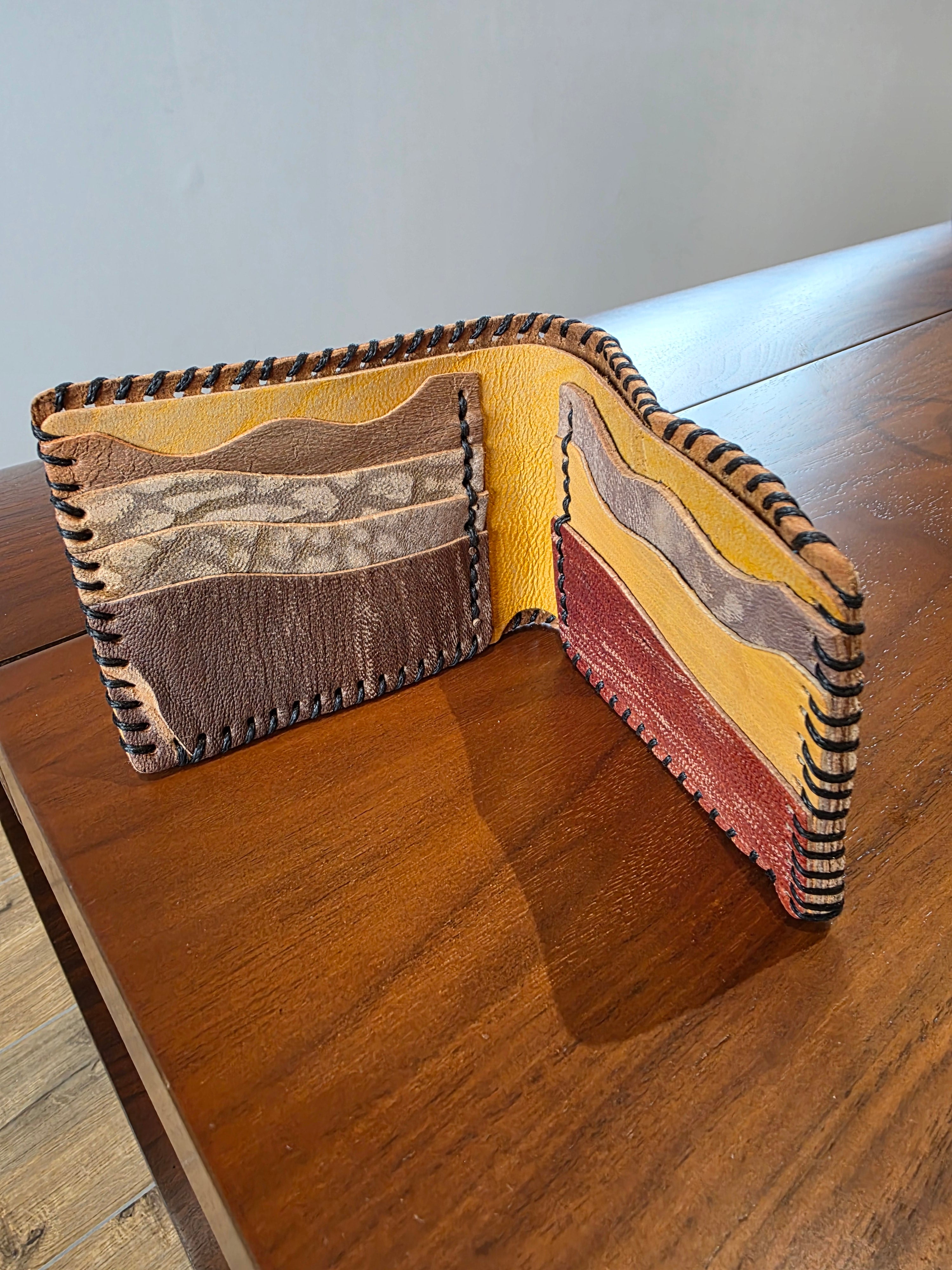 Geldbeutel aus Rindsleder mehreren Farben. Handgenäht