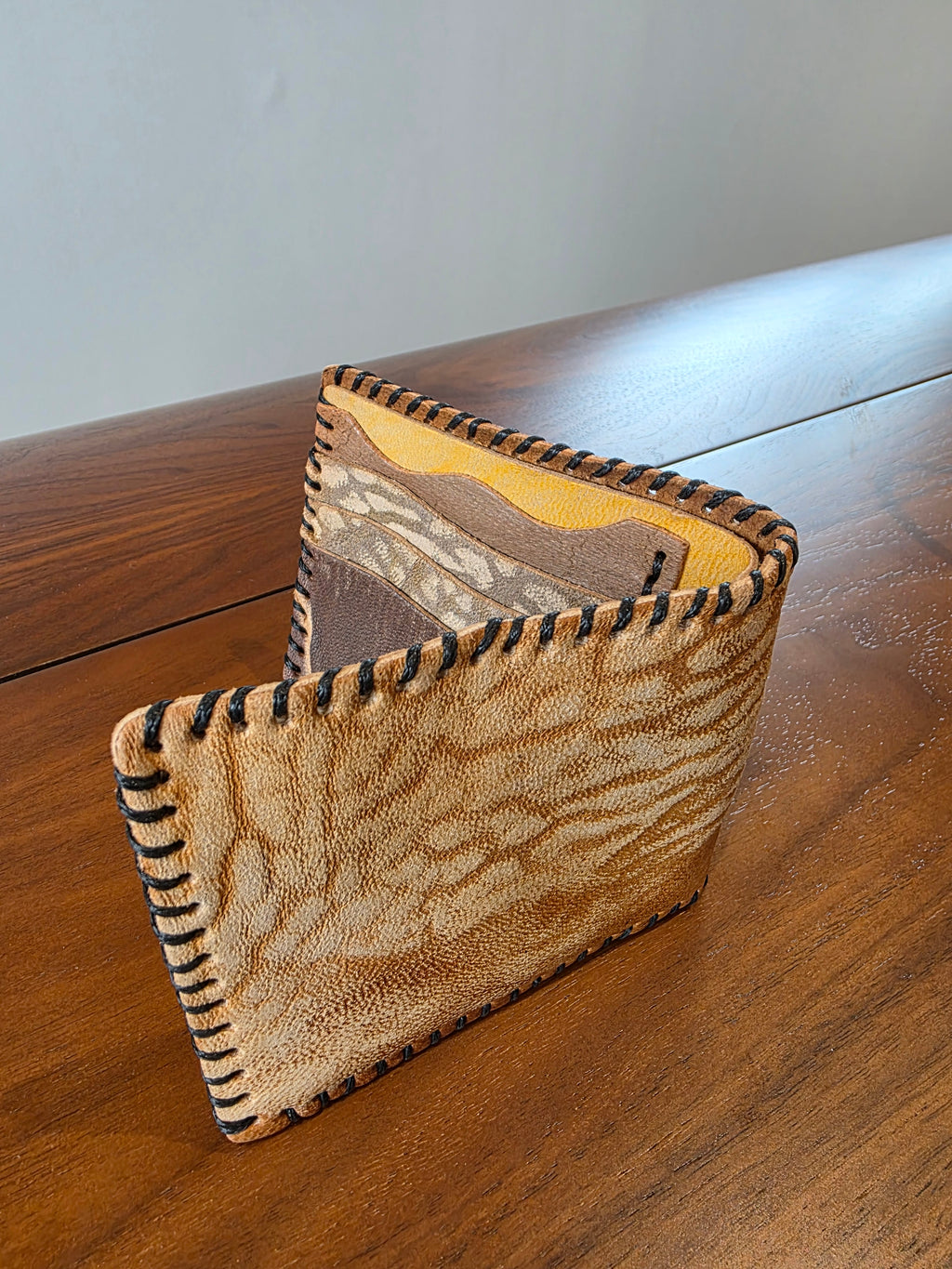 Geldbeutel aus Rindsleder mehreren Farben. Handgenäht