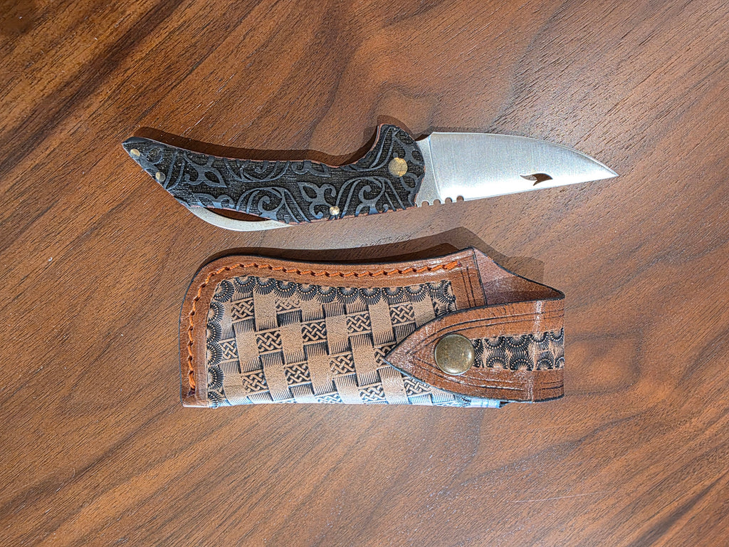 Taschenmesser N690 Stahl, linen Micarta gravur, inkl .Lederetui.