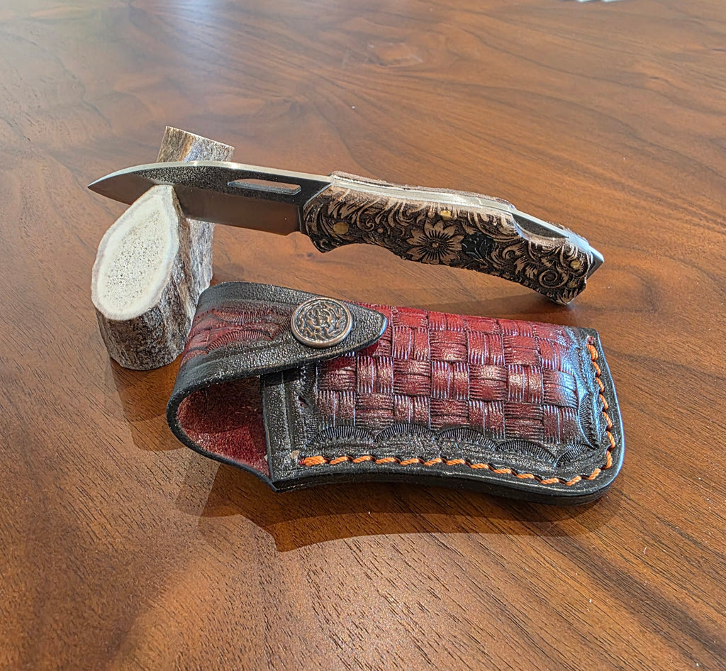 Taschenmesser N690 Stahl, Micarta gravur Griff inkl. Lederetui.