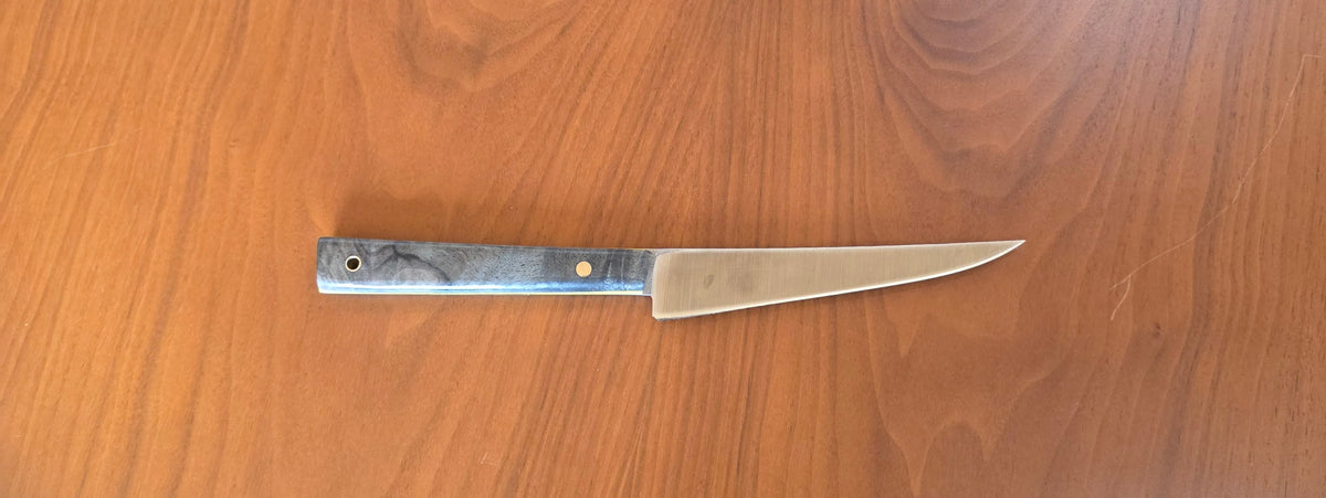 Koch- und Filetiermesser aus N690 Stahl mit stabilisiertem Amboinagriff